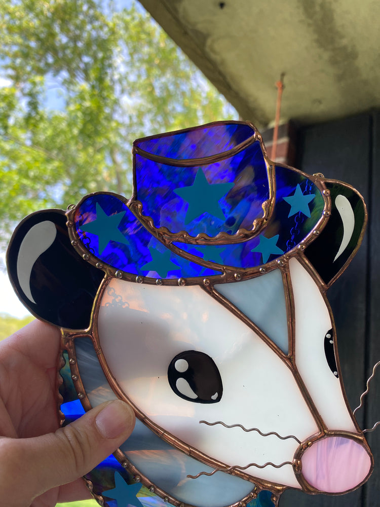 Blue Iridescent Cowboy Opossum Stained Glass Suncatcher