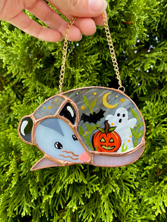 Pumpkin, Ghost, and Bat Sleepy Opossum Mini Stained Glass Suncatcher