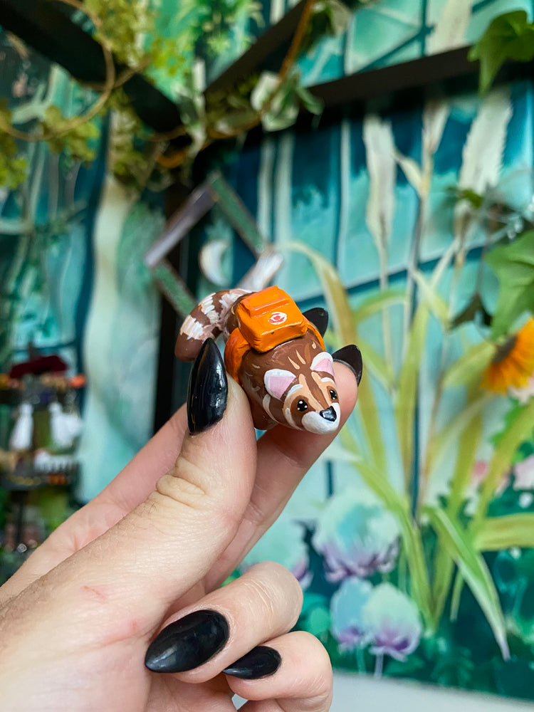 Backpack Racoon Figurine